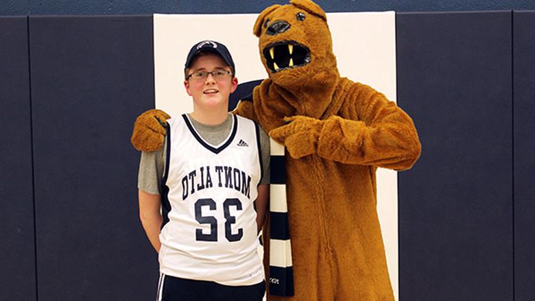 Preston Harris with Nittany Lion