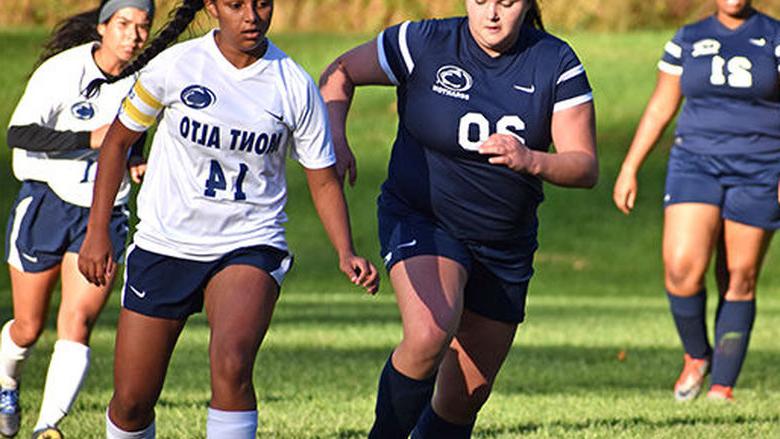 Four women soccer players