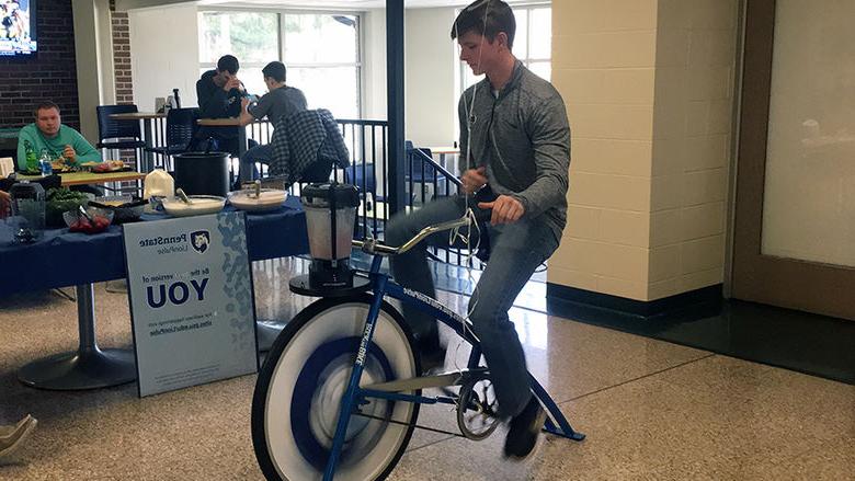 Mont Alto student riding the smoothie bike